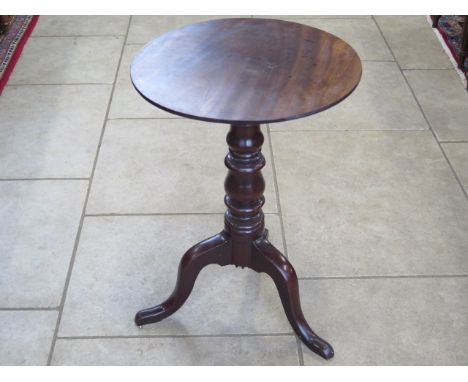 A 19th century mahogany tripod table, 70cm tall x 49cm diameter 