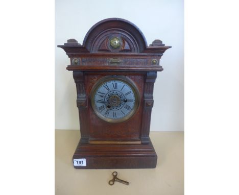 A Teutonia alarm mantle clock, with a P.H and S movement, 36cm tall, working 