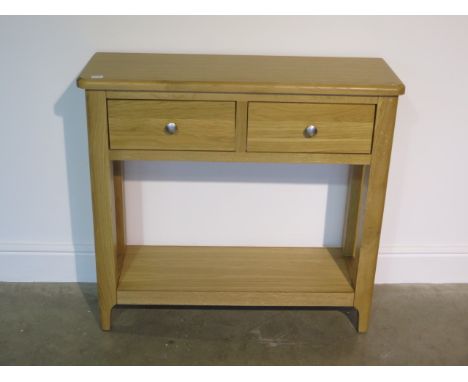 An ex-display Nordic oak two drawer console table - 90cm W x 30cm D x 83cm H 