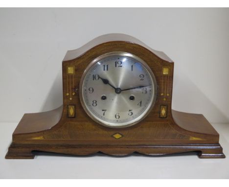 An 8 day clock, mahogany case with mother of pearl inlay, strikes on coiled gong 