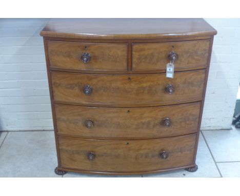 A good quality Victorian bow front chest with mother of pearl inlaid drawer knobs and standing lobed bun feet, chest comprise