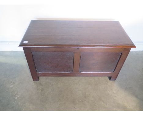 An oak two panel early 20th century coffer/blanket box, 50cm tall x 93cm x  - in good polished condition 