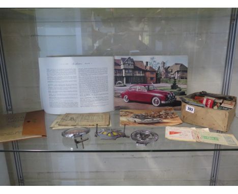 A collection of vintage motorcycle parts lists, workshop manuals, Triumph spanner and The books on British Motorcycles 