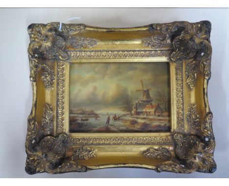 A small oil on panel Dutch scene, in an ornate gilt frame, 23x28cm 