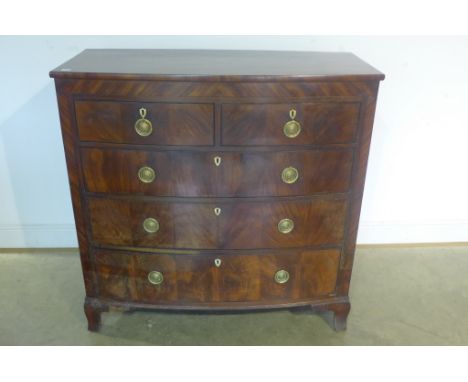 A 19th century mahogany bow fronted chest with two short over three long drawers on splayed bracket feet, 115cm tall x 116cm 