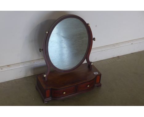 A 19th century mahogany bow fronted two drawer dressing mirror, 63cm tall x 50cm x 22cm 