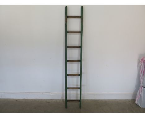 A vintage green painted six rung ladder - waxed  Height 183cm x Width 29cm 