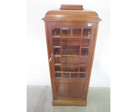 A mahogany hall cupboard single multi-panel glass door on plinth base - 57cm x 35cm x 146cm 