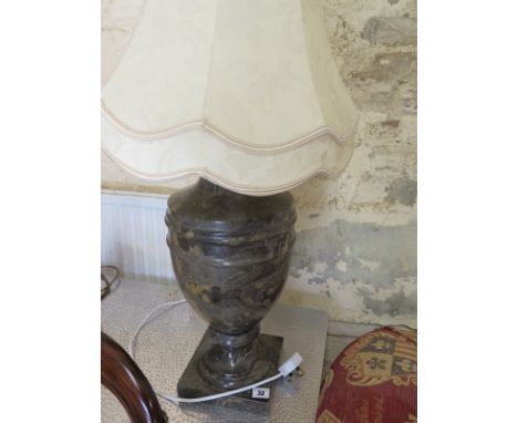 A granite table lamp and shade 
Condition report: In working order