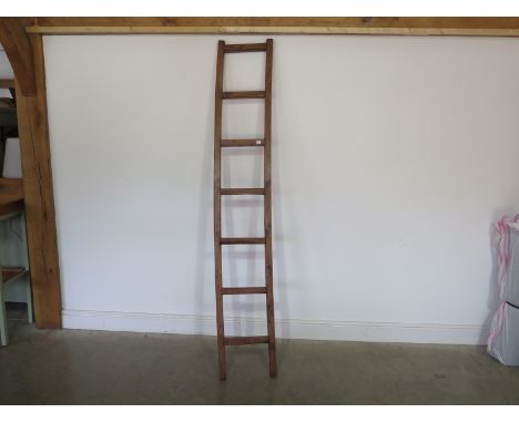 A cherrywood loft ladder early 20th century - waxed for decorative use - Height 216cm x 36cm 