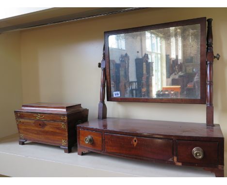 A 19th century mahogany toilet mirror and a brass inlaid tea caddy