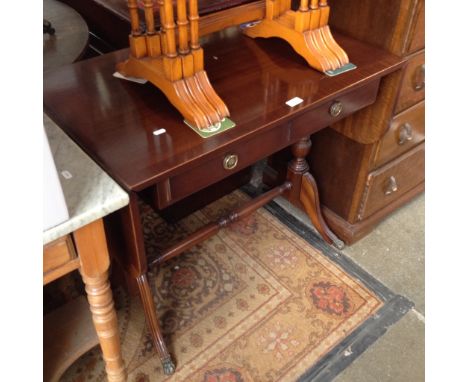 A REPRODUCTION MAHOGANY SOFA TABLE.