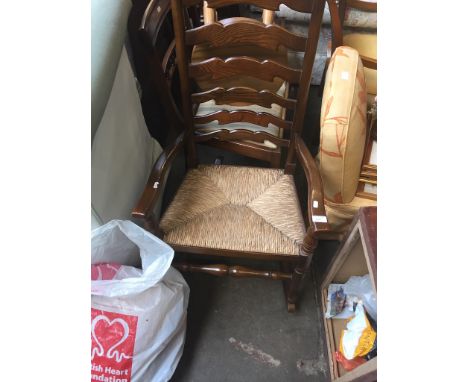A RUSH SEATED LADDER BACK ROCKER