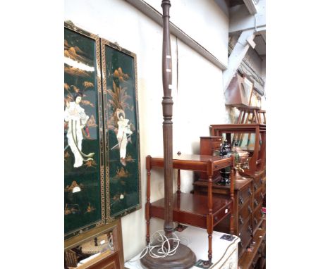 A TURNED AND REEDED LAMP STANDARD.
