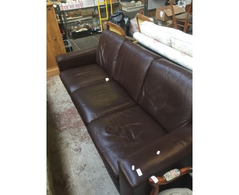 A BROWN LEATHER 3 SEATER SOFA