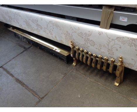 BRASS FIRE GRATE AND GAS FIRE SURROUND.