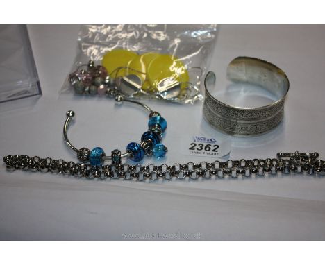 A white metal Bangle, necklace and bracelets