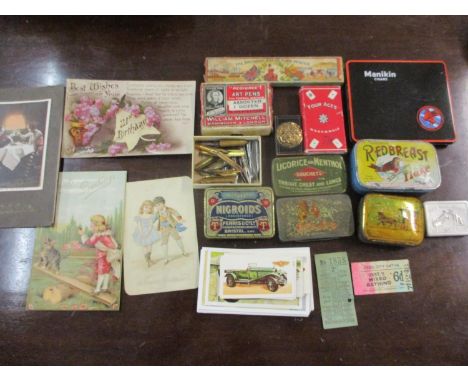 A small quantity of vintage tins, pen nibs, a vintage Leeds City Transport ticket, mixed vintage greeting cards and other ite