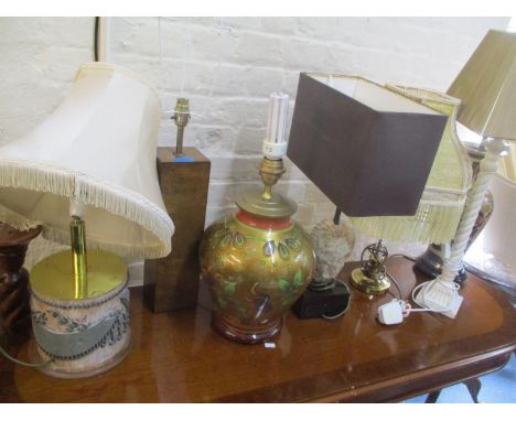 Mixed table lamps to include one having a wall paper print block column and others 