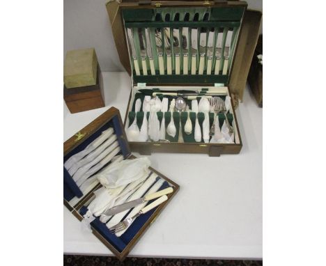 A cased silver plated cutlery set and a cased silver plated fish knife and fork set 