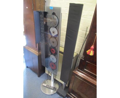 A Bang &amp; Olufsen floor standing CD player with speaker 