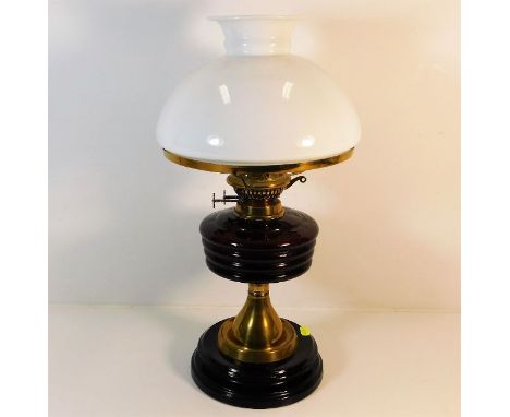 An early 20thC. brass fitted oil lamp 18in high