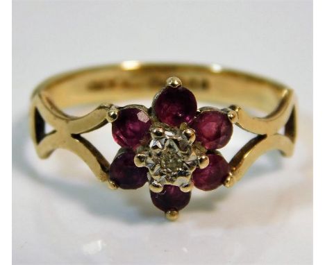 A 9ct gold ring set with diamond &amp; ruby 1.9g size N/O