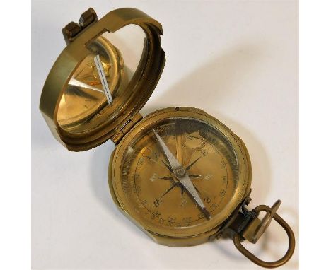 A brass cased military style compass 