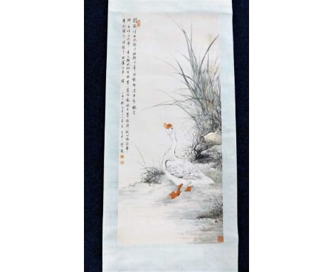 A c.1900 Chinese watercolour scroll with goose at rivers edge decor, signed 86.5in long, images size 46in x 20.25in