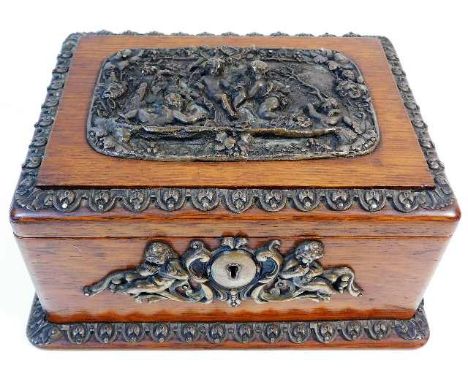 A decorative tea caddy with relief copper decor 8.5in wide x 6.5in deep x 4in tall