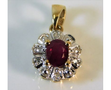 A 9ct diamond &amp; ruby pendant 0.9g