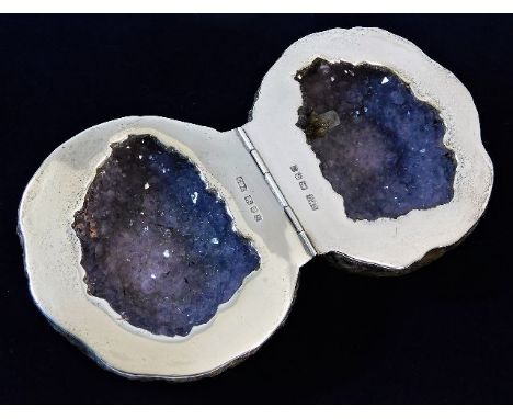 A hallmarked silver mounted split amethyst geode. Provenance: Formerly the property of Mrs. Michele Dotrice &amp; her husband