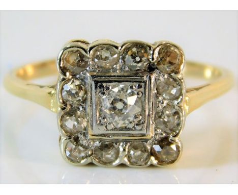 An antique yellow metal ring set with approx. 0.85ct diamonds 3.8g size T