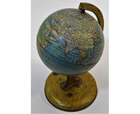 A vintage 1950's tinplate globe 8in high