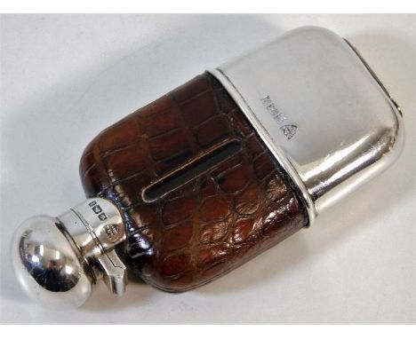 A 1910 silver mounted hip flask by G &amp; J W Hawksley Sheffield