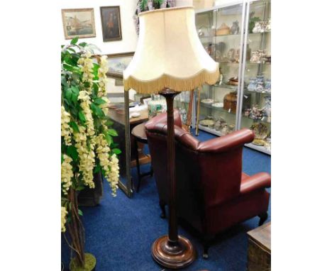 A mahogany standard lamp with traditional frilled shade 70in high inclusive