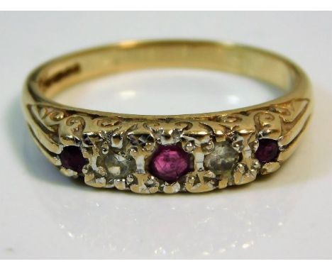 A 9ct gold ring set with ruby &amp; diamond ring with carved mount 2.7g size N/O 