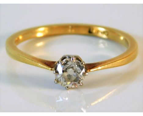 An 18ct gold ring set with approx. 0.5ct diamond 2.6g size R