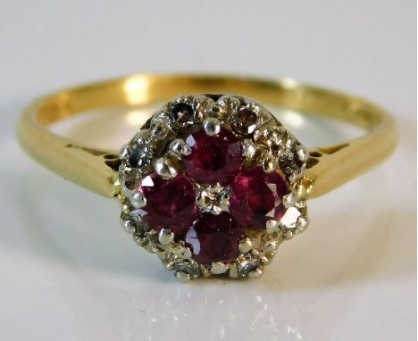 An 18ct gold diamond &amp; ruby ring 3.7g size R/S