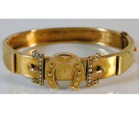 An antique yellow metal bangle with seed pearl decor 14.4g