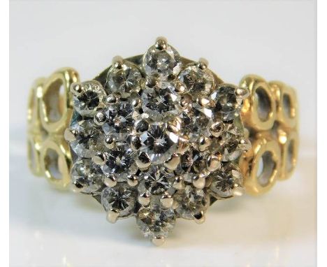 An 18ct gold diamond cluster ring of approx. 1.25ct 7g size Q/R