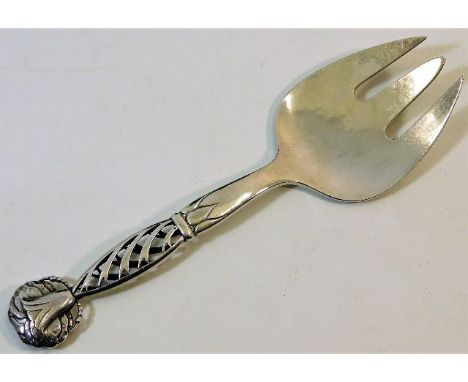 A Georg Jensen silver serving fork with hollow fretwork handle &amp; decorative organic finial c.1925-35 7.75in approx. 70g