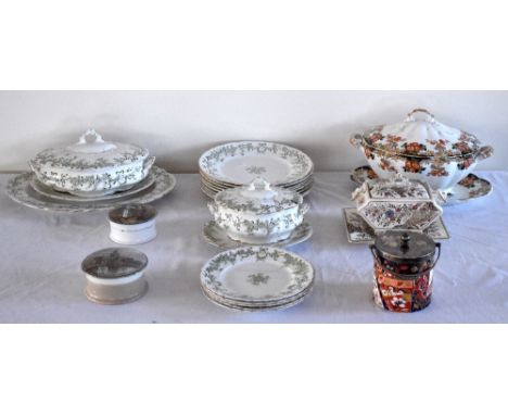 A group of Victorian ceramics, including a Ridgeways 'Old Derby' biscuit barrel, two pot lids 'Church of the Holy Trinity, St