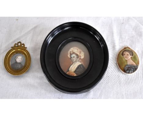 19TH CENTURY ENGLISH SCHOOL; an oval portrait miniature of a woman wearing a lace bonnet, unsigned, inscribed verso 'A. Digby