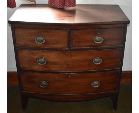An early 19th century mahogany bowfronted chest of two short and two long drawers raised on splayed bracket feet, height 88cm