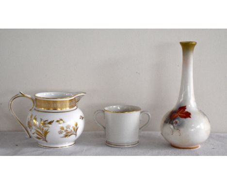 ROYAL WORCESTER; a small vase painted with Autumn leaves and berries in the style of Kitty Blake, shape 2491, height 13.5cm, 