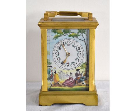 A 20th century brass carriage clock with painted dial and side panels, the back plate inscribed 'Deacon, Swindon' and numbere
