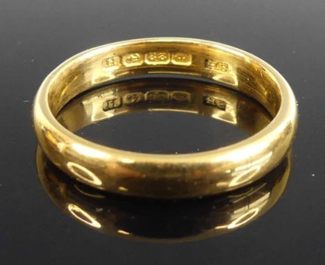 A 22ct gold court shaped wedding band, sponsor SH, size P, 5.1g