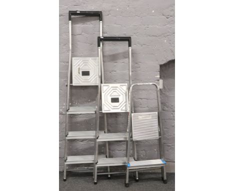 Three pairs of alluminium step leadders by Hailo and Beldray. 