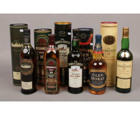Four full and sealed bottles of Scotch Whisky and a bottle of Irish Whiskey. To include The Famous Grouse vintage malt, Glenf